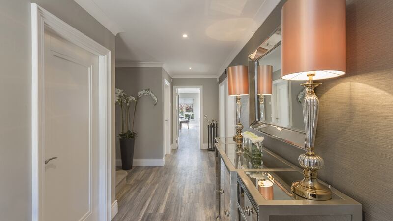 Aged floors give a new build a lived-in sensibility like this barn-oak laminate, €14.99 per sq m, ex fitting and underlay, from tilemerchant.ie