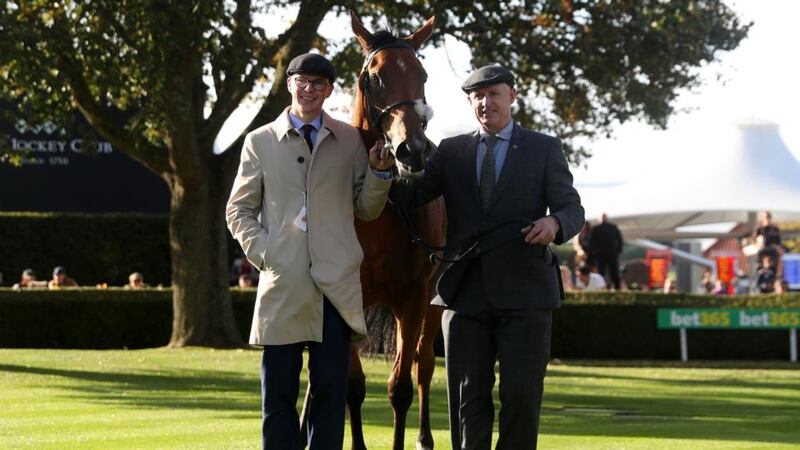 Trainer Joseph O’Brien (L) with Iridessa after her Group One victory at Newmarkey. Photograph: Simon Cooper/PA