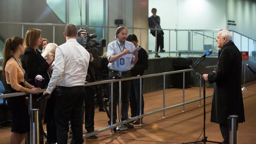 Riyad H Mansour (right), permanent observer of the State of Palestine to the United Nations, addresses the media after handing copies of instruments of accession to the International Criminal Court to the United Nations. Photograph: Evan Schneider/EPA/Handout.