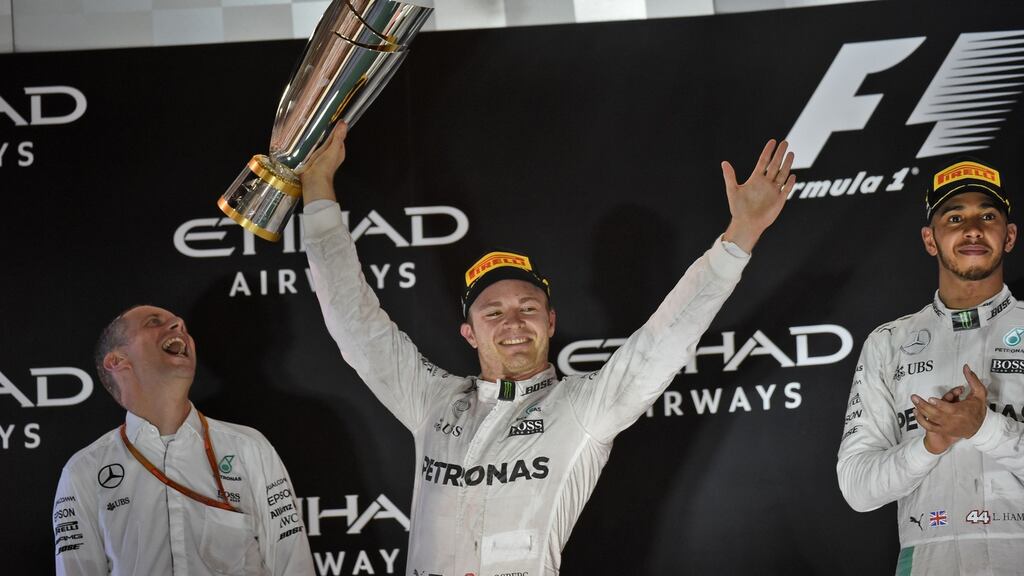 Nico Rosberg celebrates at the end of the Abu Dhabi Formula One Grand Prix. Photograph: Mohammed Al-Shaikh/AFP/Getty Images