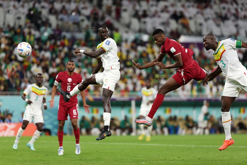 Mohammed Muntari heads home Qatar's goal during the World Cup Group A match against Senegal at Al Thumama Stadium in Doha. Photograph: Dean Mouhtaropoulos/Getty Images