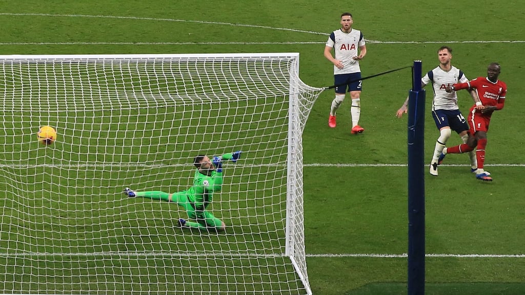 Sadio Mane scores Liverpool’s third against Tottenham. Photograph: Catherine Ivill/Getty/AFP