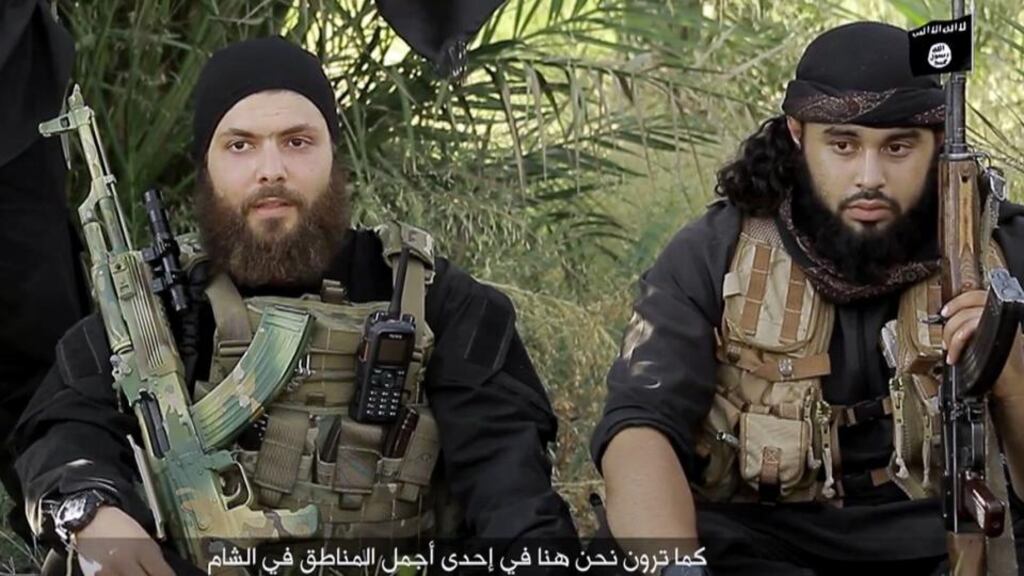 Members of Islamic State speaking in a video they recorded in which they called on Muslims to travel to IS areas to join the radical jihadist group: a number of Dutch children have recently threatened to travel to Iraq or Syria to join Islamic State. Photograph: Ho/AFP/Getty Images
