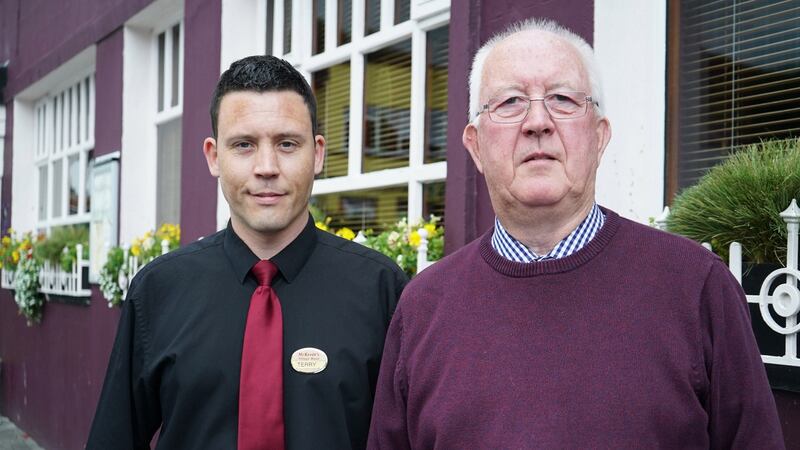 Father and son Terry and Terry McKevitt outside McKevitt’s Village Hotel in Carlingford. Photograph: Enda O’Dowd