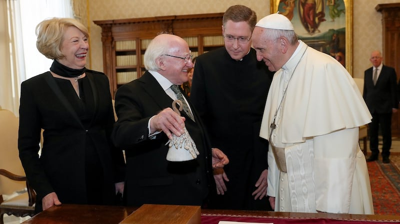 President Michael D Higgins (centre) and Sabina Higgins (left) exchanges gifts with Pope Francis in the Vatican City Rome, on Monday. Photograph: Maxwells