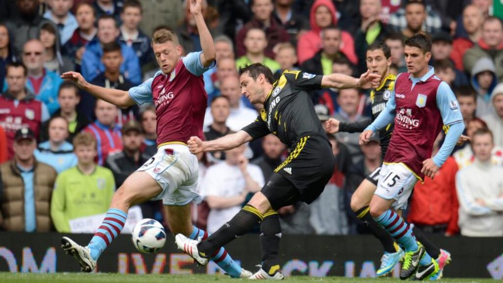 Chelsea’s Frank Lampard scores his first goal to equal Bobby Tambling’s club record of 202 against Aston Villa at Villa Park. The midfielder also scored a second to secure the points and the record. Photograph: Philip Brown/Reuters