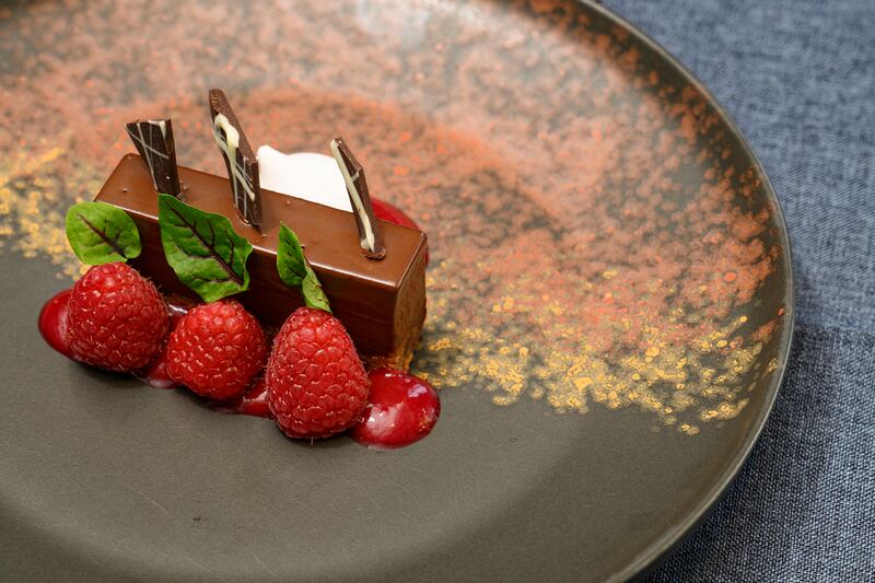 Milk chocolate torte paired with fresh raspberries. Photograph: Michael McLaughlin