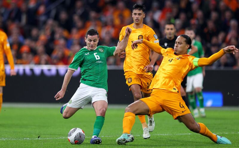 Ireland’s Josh Cullen with Virgil van Dijk puts in a block on Josh Cullen while leading the Netherlands to the European Championships. Photograph: Ryan Byrne/Inpho
