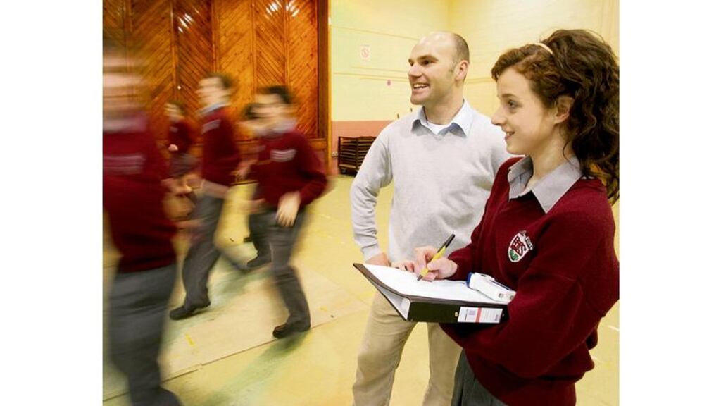 Niamh Byrne with her teacher, Ivan Morrissey, and students at Presentation/De La Salle College, Bagenalstown. Photograph: Alan Betson
