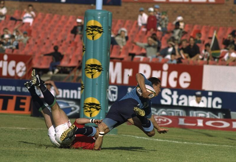 Tony Underwood (left) of the British and Irish Lions tackles Wynand Lourens of Northern Transvaal in Pretoria, South Africa, in June 1997. Photograph: David Rogers/Allsport