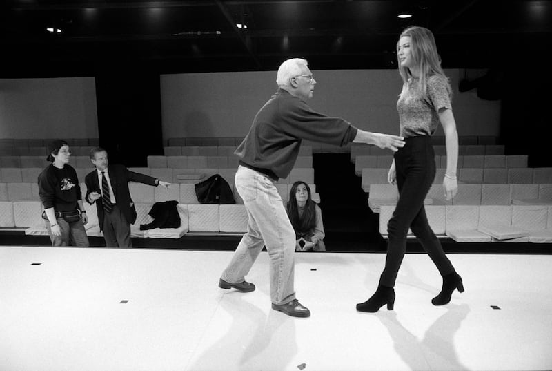 Giorgio Armani setting up his fashion show in New York, 1993. Photograph: Fred R Conrad/ New York Times