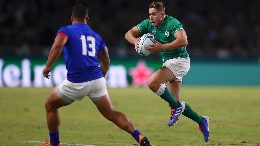 Ireland fullback Jordan Larmour runs with at Samoa’s Alapati Leiua during the Rugby World Cup Group A game at the Hakatanomori Stadium in Fukuoka. Photograph: Michael Steele/Getty Images