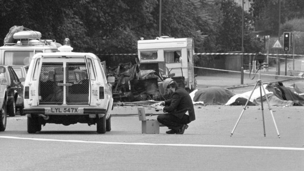 A police photographer at the scene of the 1982 car bomb in Rotton Row, Hyde Park, London. The blast killed and injured a party of cavalrymen on their way to the guard changing ceremony in Whitehall, after an IRA bomb exploded as the Household Cavalry was passing. Photograph: PA News/PA Wire