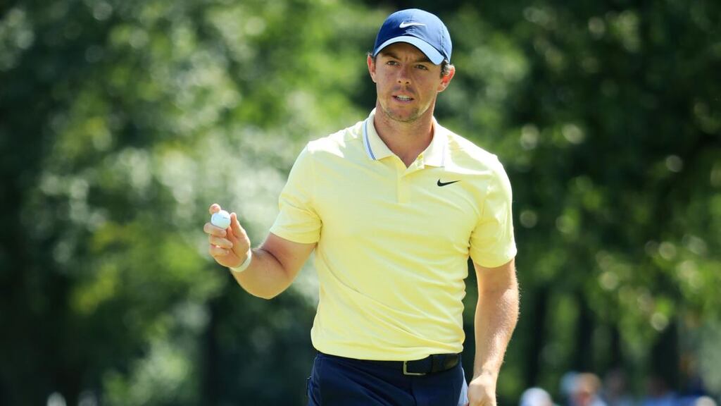 Rory McIlroy acknowledges the applause from the crowd on the 18th green during the first round of the BMW Championship at Medinah Country Club in Illinois. Photograph: Andrew Redington/Getty Images