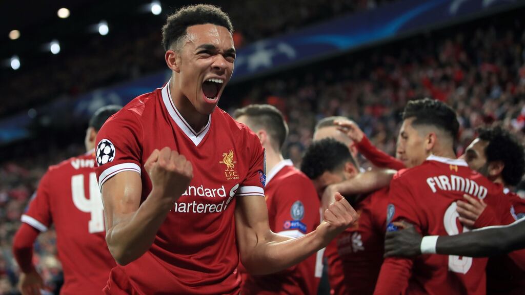 Liverpool’s Trent Alexander-Arnold celebrates after Alex Oxlade-Chamberlain’s goal. Photograph: Peter Byrne/PA