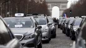 French taxi driver row with Uber service accelerates
