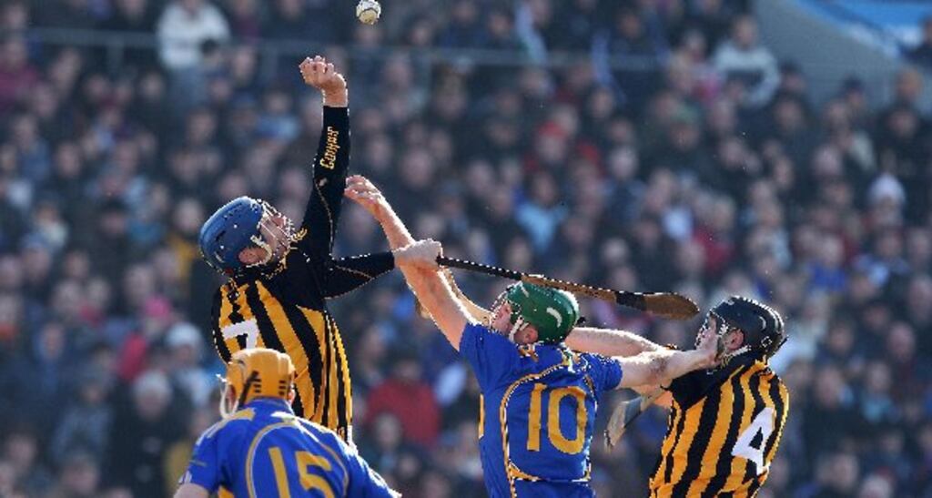 Tipperary's Noel McGrath with JJ Delaney and John Dalton of Kilkenny during the 2010 league clash. Photograph: Cathal Noonan/Inpho