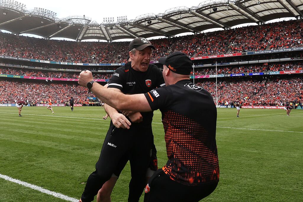 Armagh manager Kieran McGeeney celebrates at the final whistle with Kieran Donaghy after the All-Ireland SFC win over Galway at Croke Park. Photograph: Bryan Keane/Inpho