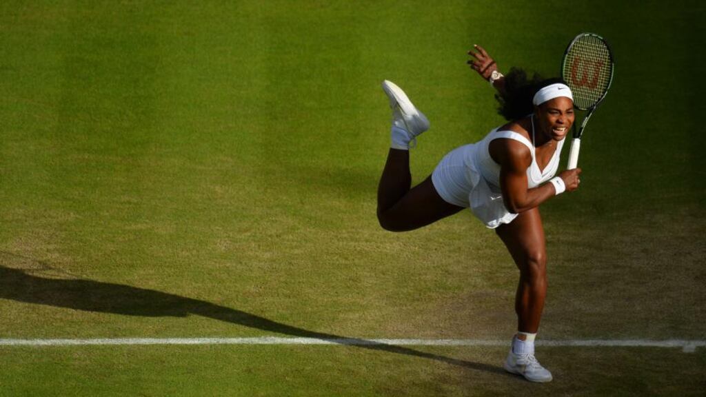 Serena Williams serves during her quarter-final against Victoria Azarenka. Photograph: Glyn Kirk/AFP/Getty Images