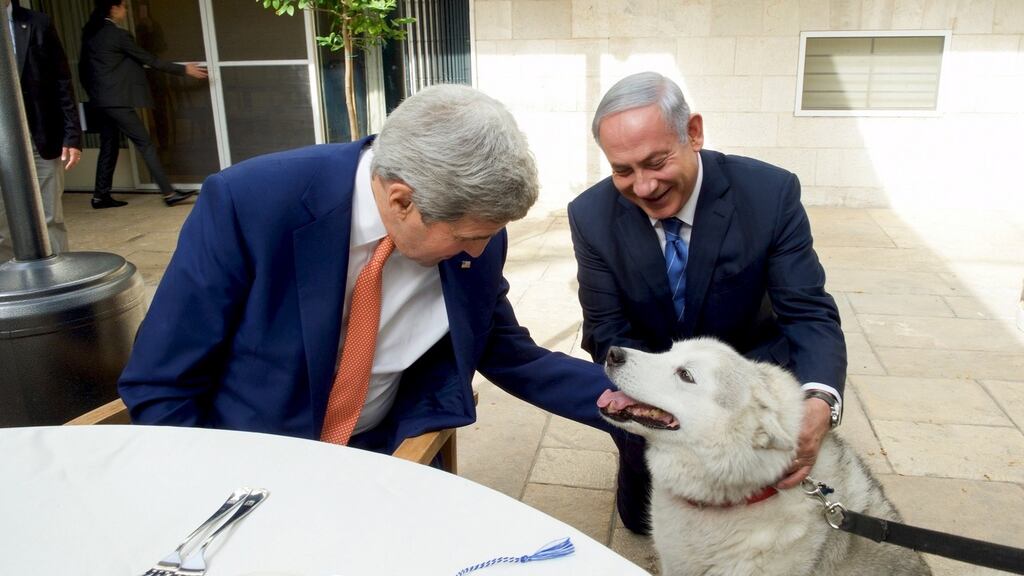 Israeli prime minister Benjamin Netanyahu (R) shows US secretary of state John Kerry his recently adopted dog Kaiya, during their meeting in Jerusalem last month. Photograph: US State Department Photo/Public Domain/Handout via Flicker