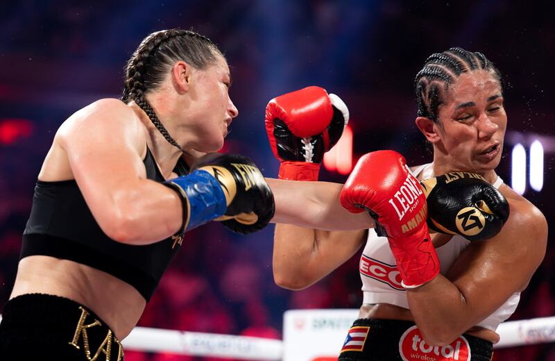 Katie Taylor catches Amanda Serrano with a left hook during their fight at MSG on Friday. Photograph: Al Bello/Getty Images for Netflix