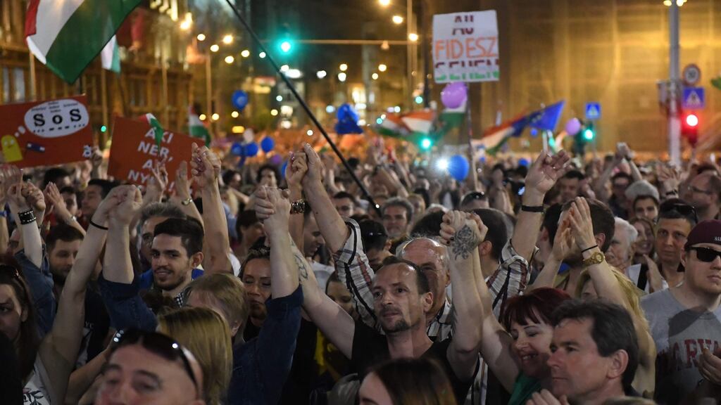 Protesters take part in an anti-government demonstration in Budapest, Hungary. Photograph: AFP/Getty Images