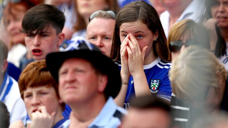 Monaghan fans look dejected during the All-Ireland Senior Football Championship quarter-final between Monaghan and Kerry at St Tiernach’s Park, Clones. Photograph: ©INPHO/James Crombie