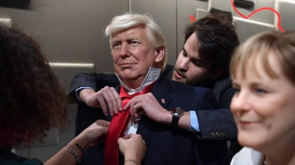 Employees put the final touches to the waxwork model of US president-elect Donald Trump ahead of its unveiling at the Grevin museum in Paris. Photograph: EPA