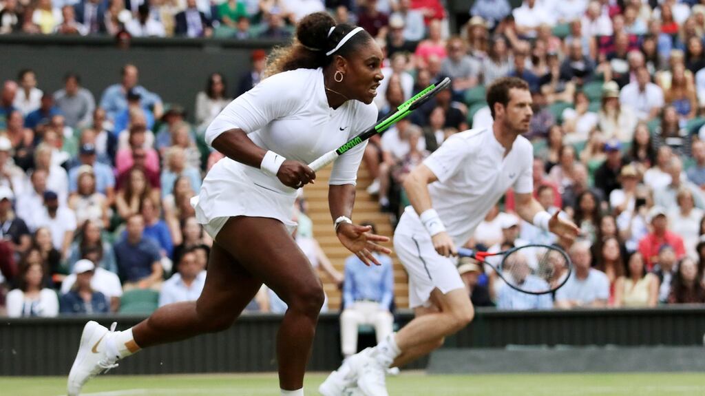 Scotland’s Andy Murray and Serena Williams of the US in action during their first round mixed doubles match. Photograph: Reuters