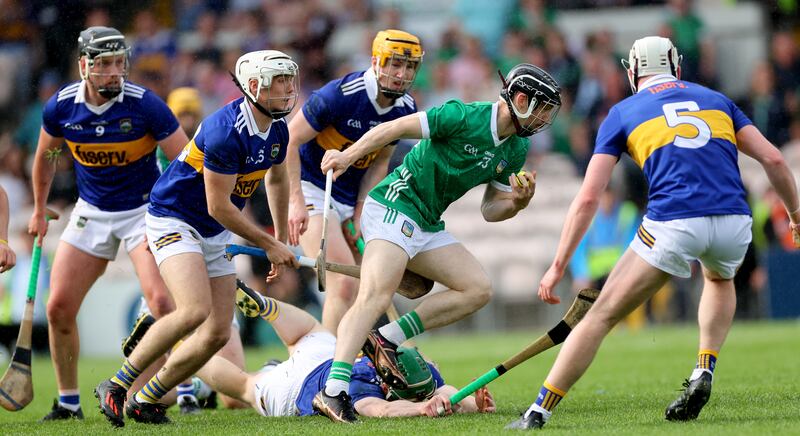 Limerick’s Graeme Mulcahy is surrounded by Tipperary defenders. Photograph: James Crombie/Inpho