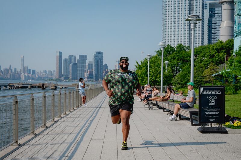 More than a decade after he took up running, with eight marathons to his name, Evans still weighs 300 pounds. Photograph: Desiree Rios/New York Times