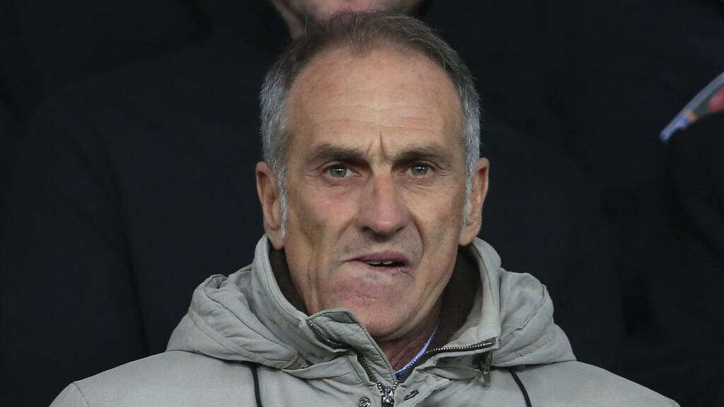 Swansea City’s Italian head coach Francesco Guidolin standing in the stands as he attends the English Premier League football match between Swansea City and Watford at The Liberty Stadium. Photograph: Getty Images