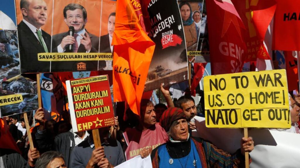 Protesters against any possible Turkish action in Syria demonstrate in front of the Turkish Parliament in Ankara today. Photograph: Umit Bektas/Reuters