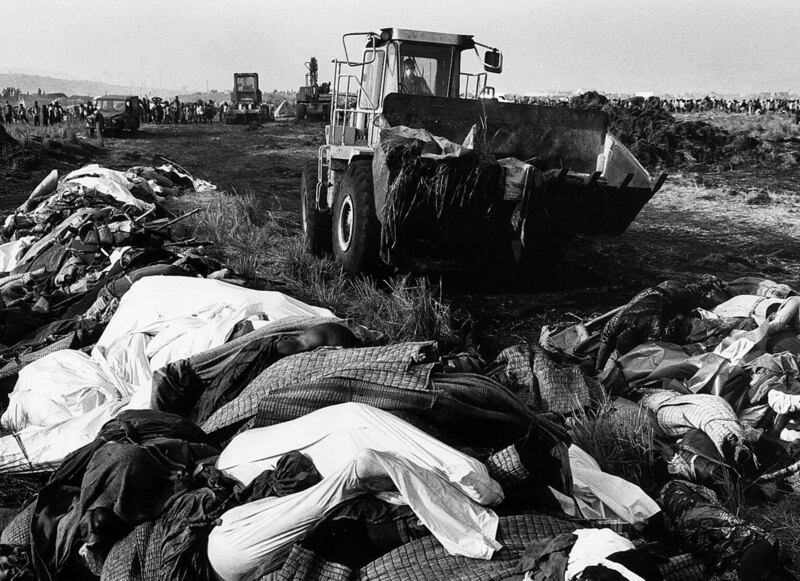 Mass grave for Rwandan refugees who had died of disease in Goma, Zaire (present day Congo) in July 1994. Photograph: Unkel/ullstein bild via Getty Images