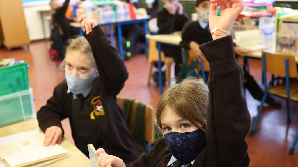 Third class pupils at St Clare’s Primary School in Harold’s Cross, Dublin wearing facemarks in the classroom on Wednesday. School principals have called for clear and concise information to be provided in order to keep schools safe from Covid-19.  Photograph: Bryan O’Brien