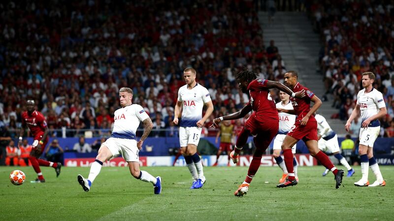 Divock Origi of Liverpool scores his side’s second goal during the Champions League final between Tottenham Hotspur and Liverpool, in Madrid, Spain. Photograph: Jan Kruger – Uefa via Getty Images