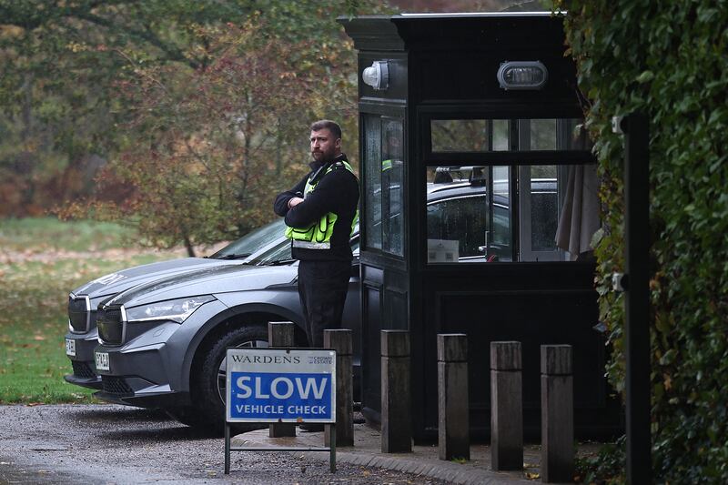 A warden stands on duty at the entrance to the Royal Lodge in Windsor on October 30th Photograph: Henry Nicholls/AFP via Getty Images