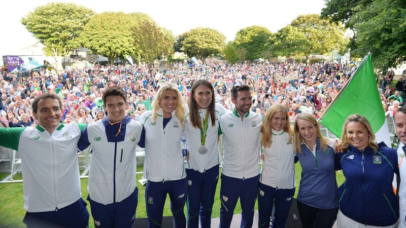 Olympic siver medal winner Annalise Murphy flanked by other members of the Irish Olympic sailing team and other Olympians at a homecoming ceremony in Dún Laoghaire. Photograph: Alan Betson/The Irish Times