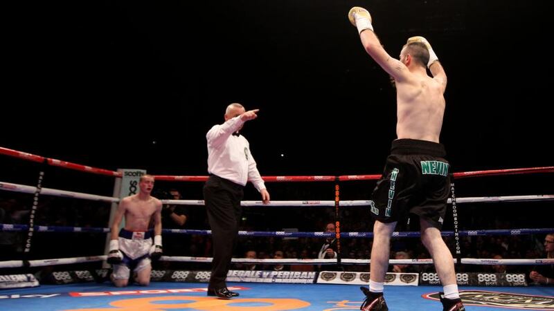 John Joe Nevin celebrates his first-round victory against Jack Heath in their featherweight contest at the 3Arena in Dublin. Photograph: Ryan Byrne/Inpho