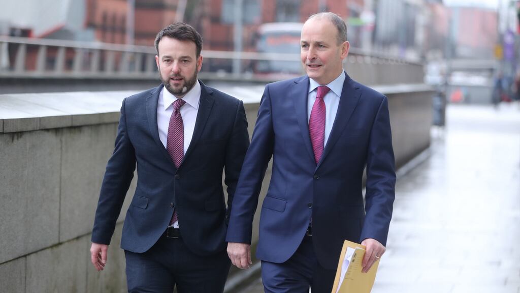 Colum Eastwood of the SDLP and Micheál Martin of Fianna Fáil arriving in Belfast last month as their political parties announce a new partnership. Photograph: Niall Carson/PA Wire