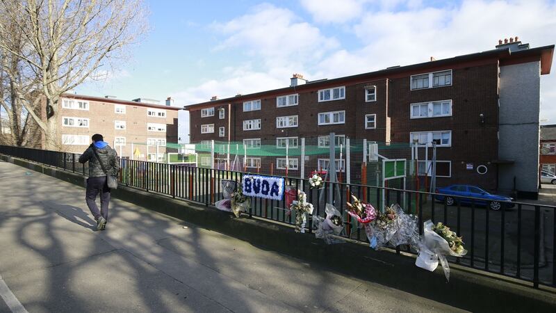 Floral tributes to murder victim outside James Larkin House. Photograph Nick Bradshaw