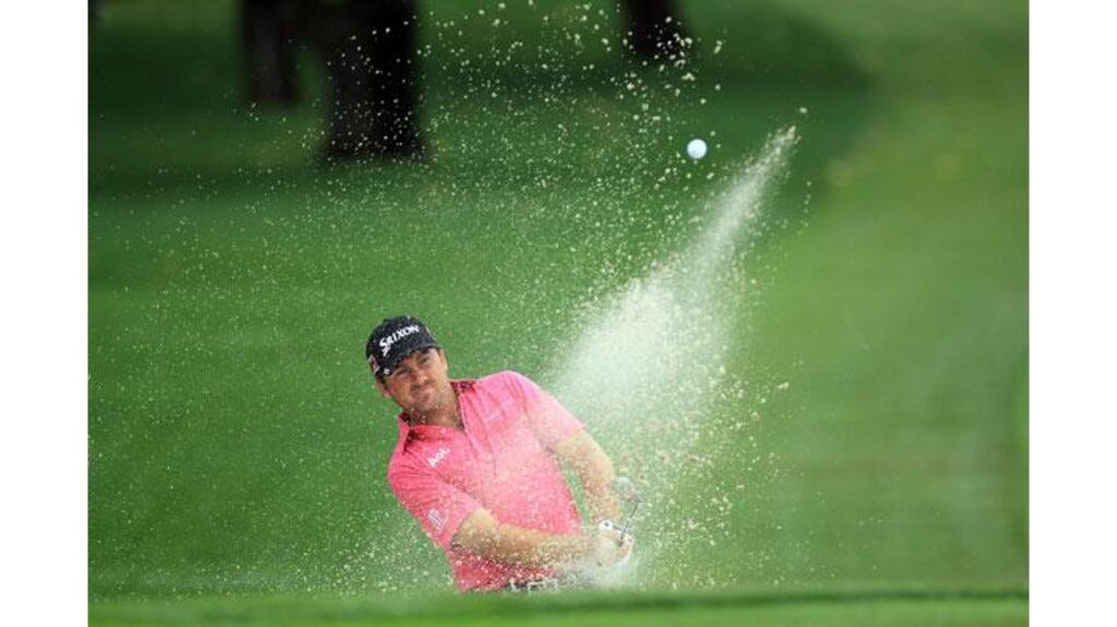 Graeme McDowell plays his third shot at the 15th hole during the first round of the Arnold Palmer Invitational at Bay Hill in Florida. The US Open Champions slumped to an opening 80. Photograph: David Cannon/Getty Images