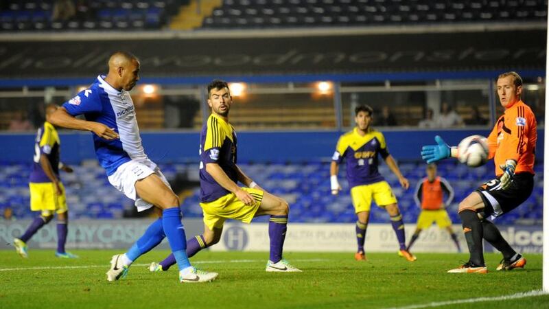 Birmingham City’s Matt Green (left) scores his sides second against Swansea City at St Andrews. Photograph: Nigel French/PA Wire