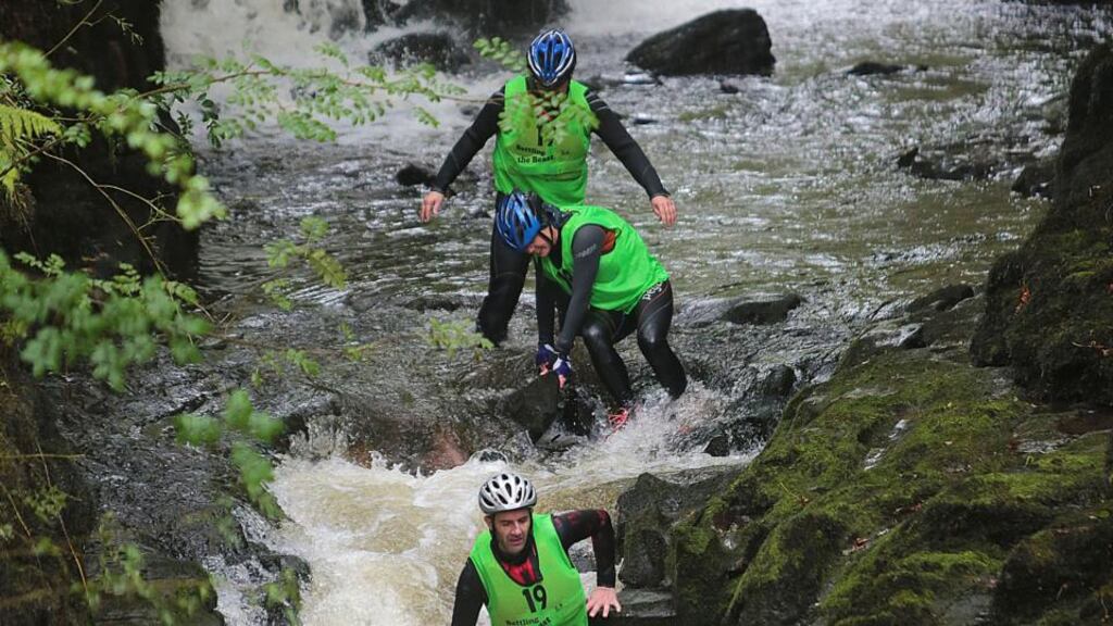 Finding the right balance..Team ‘One Track Mind’ Sean McDonnell, Caroline Reid, Denis Fletcher and Peter Barry, canyoning in the Clare Glens, Co Tipperary. Photograph: Valerie O’Sullivan