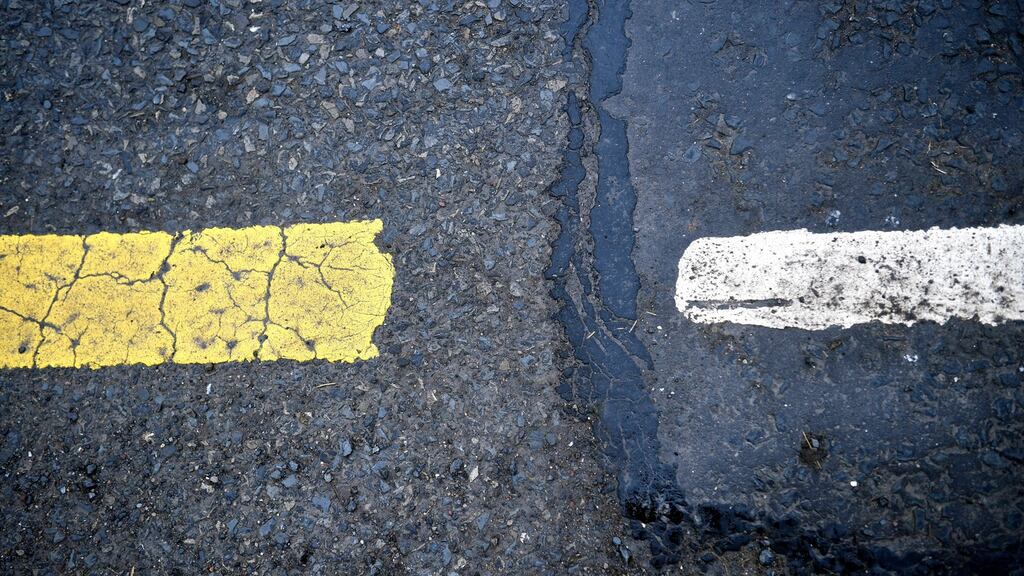 A change in road markings marking the Border between the Republic and Northern Ireland, outside the town of Middletown. Photograph: Neil Hall/EPA