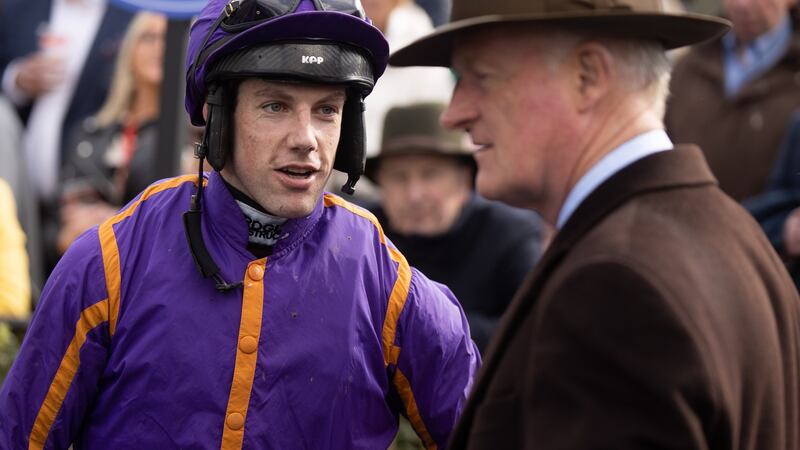 Brian Hayes speaks to Willie Mullins after the race. Photograph: Tom Maher/Inpho