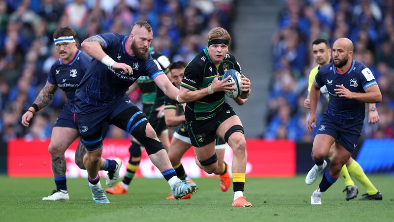 Henry Pollock of Northampton breaks clear to score a try against Leinster in Saturday's Champions Cup game at the Aviva Stadium. Photograph: David Rogers/Getty