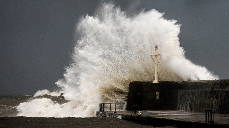 Large waves break over the south pier in Arklow, Co Wicklow, on Tuesday.  Photograph: Garry O’Neill