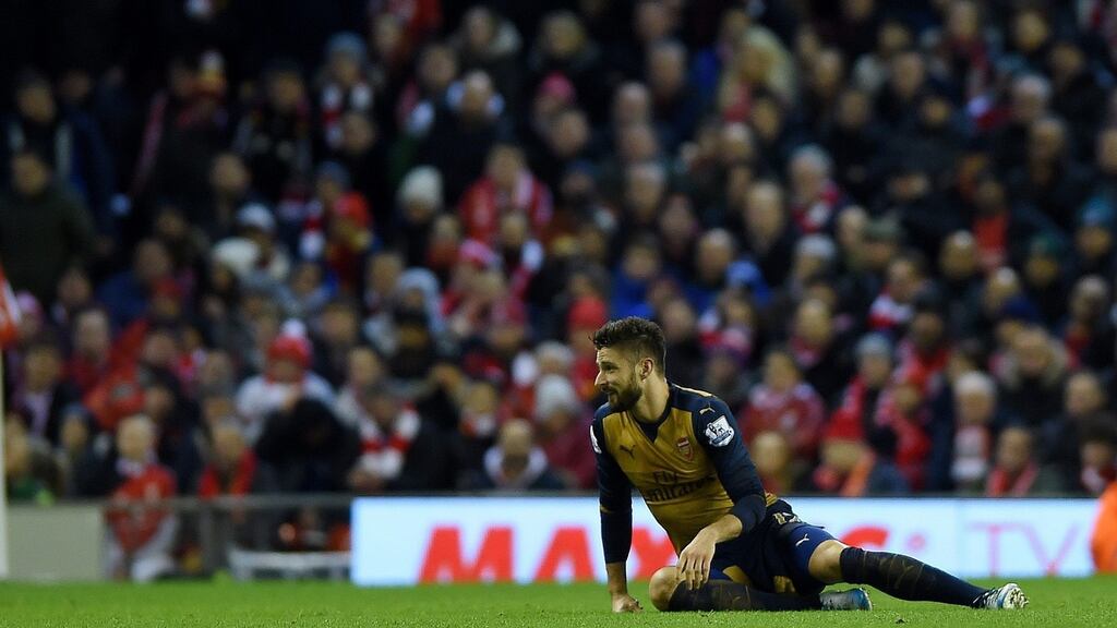 Olivier Giroud scored twice as Arsenal left Anfield with a 3-3 draw. Photograph: EPA
