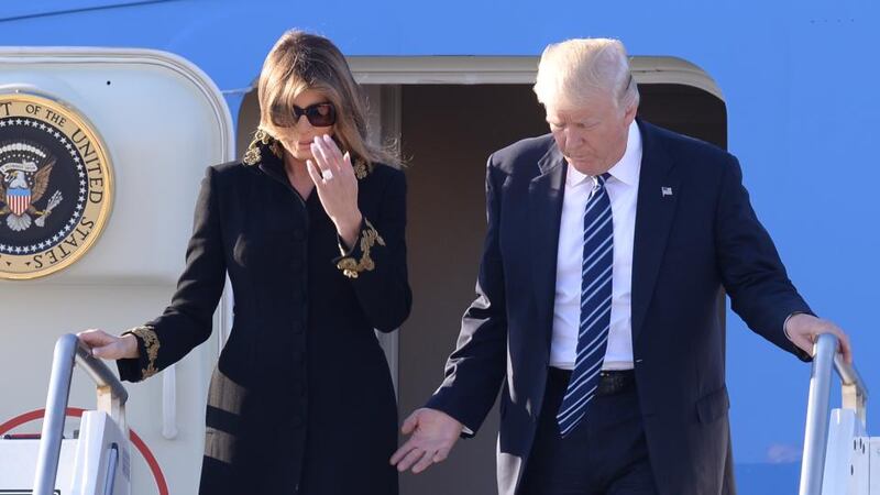 Brush-off: Melania Trump apparently avoids her husband’s hand getting off Air Force One in Rome. Thwarted, he retaliated by patting her on the bottom. Photograph: Filippo Monteforte/AFP/Getty